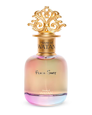 Actual product photograph of a transparent perfume bottle with pastel glass tones and an ornamental gold cap.